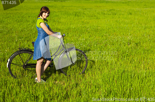 Image of Girl with a bicycle