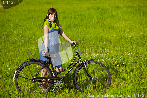 Image of Girl with a bicycle