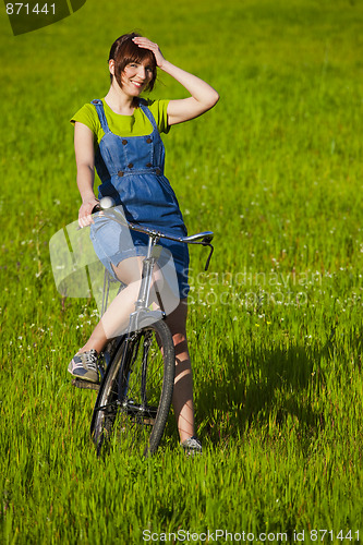 Image of Girl with a bicycle