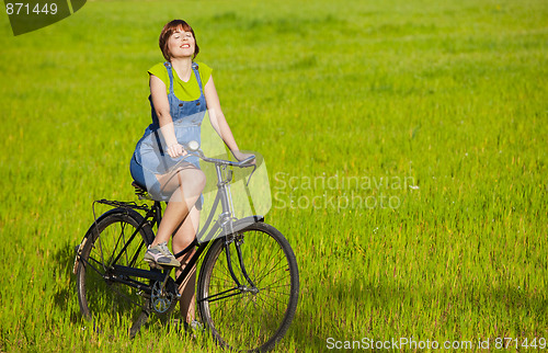 Image of Girl with a bicycle