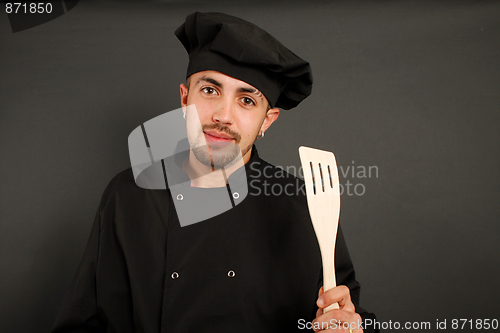 Image of Spanish cook with earrings