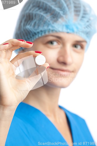 Image of smiling doctor and pill