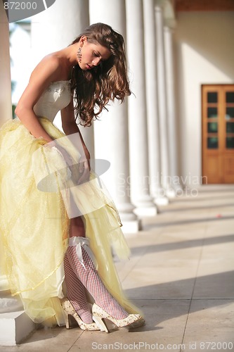 Image of bride in golden gown