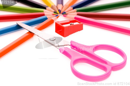 Image of Multicolor pencils and red sharpener