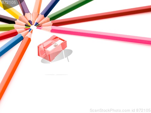 Image of Multicolor pencils and red sharpener
