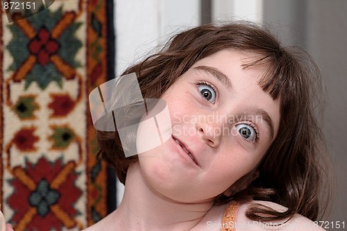 Image of Little girl making funny face