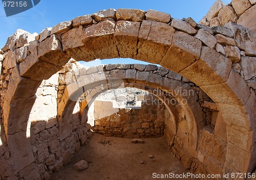 Image of Converging ancient stone arches 