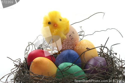 Image of Easter basket with Easter eggs and chicks