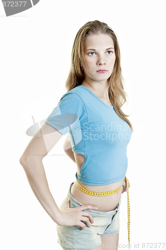Image of Slim girl with measure tape