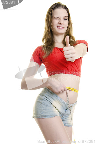 Image of Happy girl with measure tape