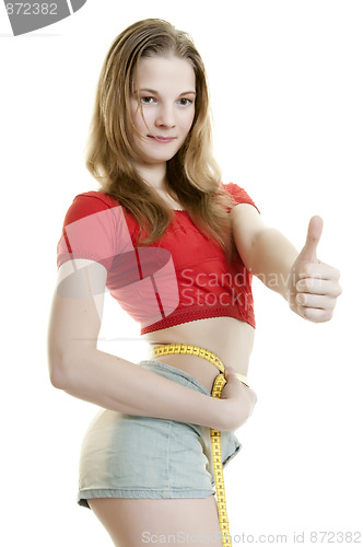 Image of Slim girl with measure tape