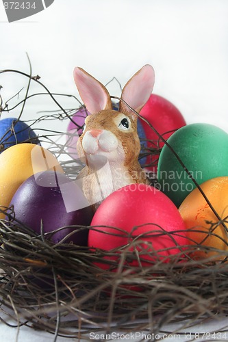 Image of Easter basket with Easter eggs and Easter bunny