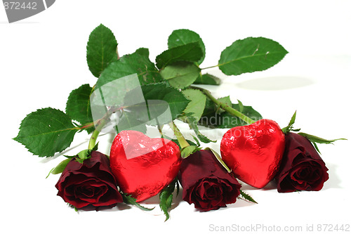 Image of red roses with red hearts