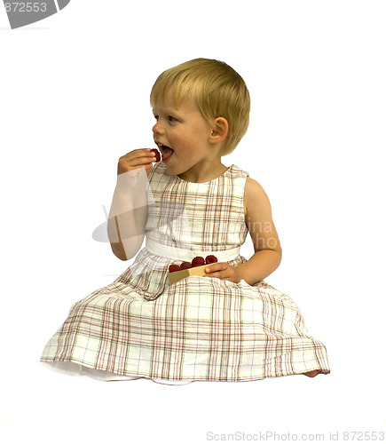 Image of Child eating raspberries
