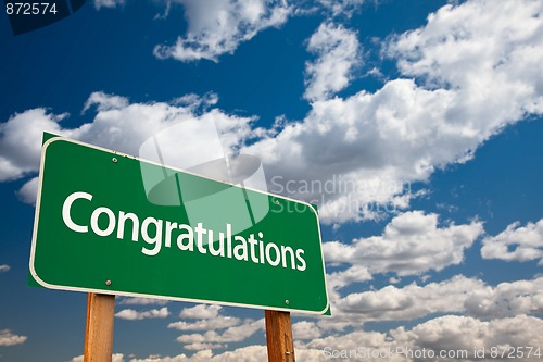 Image of Congratulations Green Road Sign with Sky