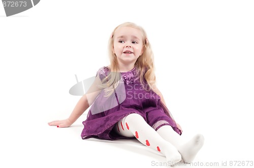 Image of Studio shot of baby girl in gala dress