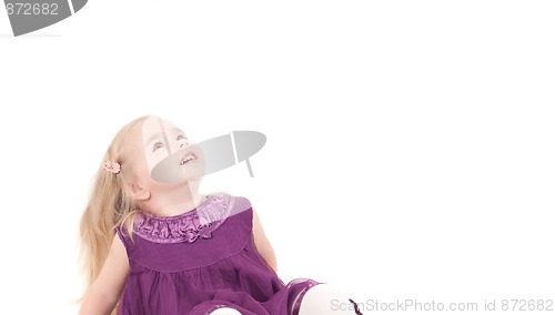 Image of Studio shot of baby girl in gala dress