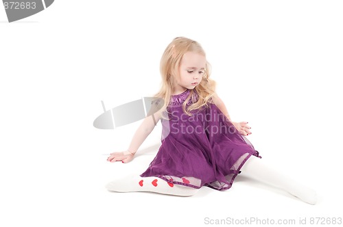 Image of Studio shot of baby girl in gala dress