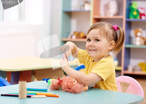 Image of Little girl play in preschool