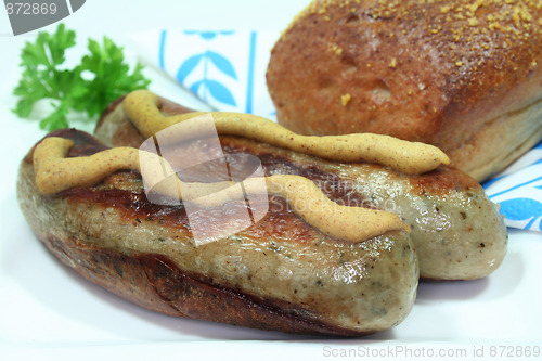 Image of bratwurst with mustard and bread