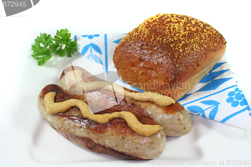 Image of bratwurst with mustard and bread