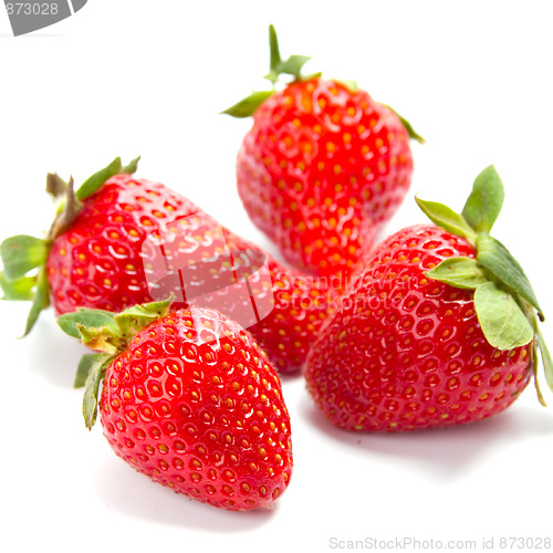 Image of four fresh strawberries