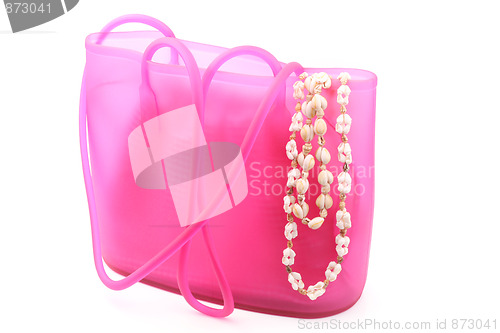Image of summer bag with beach necklace