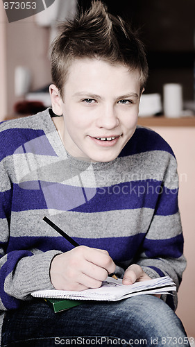 Image of teenager with pencil