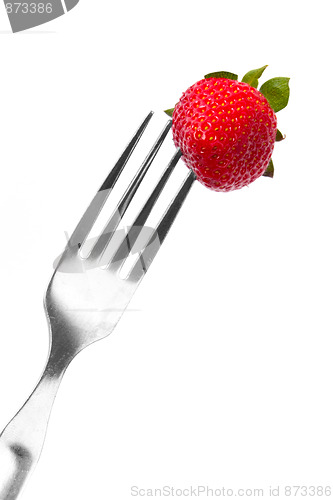 Image of fork and fresh strawberry
