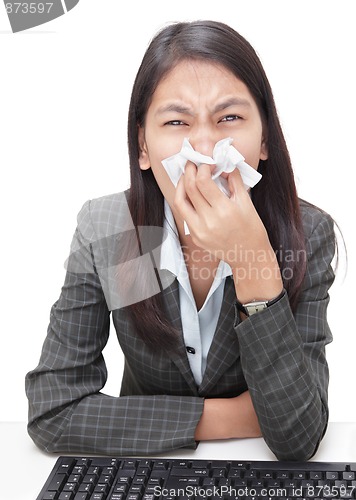 Image of Sneezing businesswoman w flu