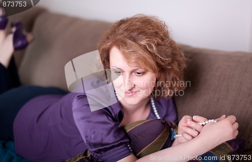 Image of Woman on Sofa