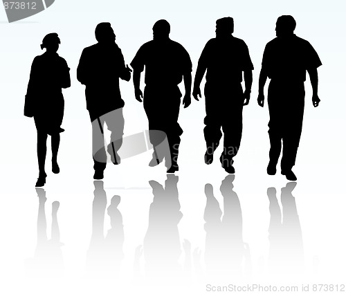 Image of Group of business people walking and talking