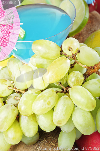 Image of Grapes and blue cocktail