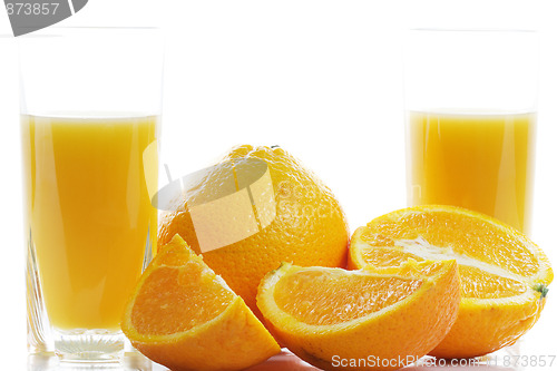 Image of Oranges and two glasses of juice