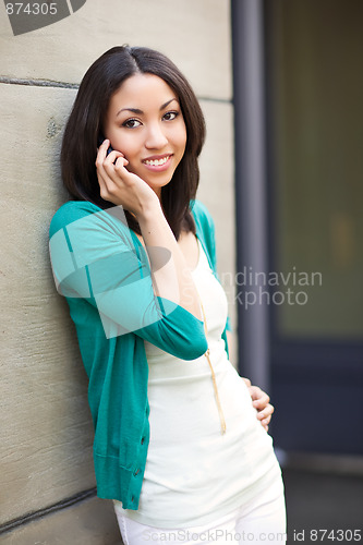 Image of Black woman on the phone