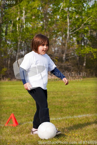 Image of Child Playing Soccer