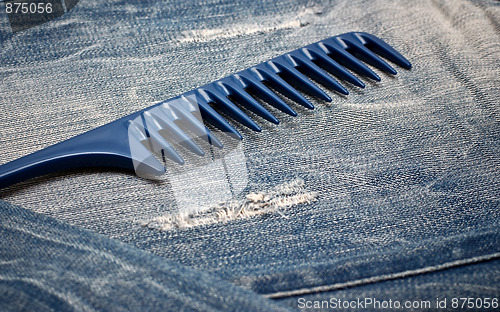 Image of Comb on the jeans 