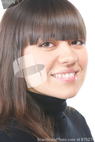 Image of Toothy smiling brunette in black