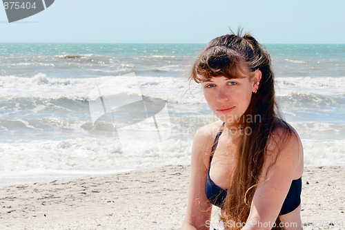 Image of beautiful woman at beach