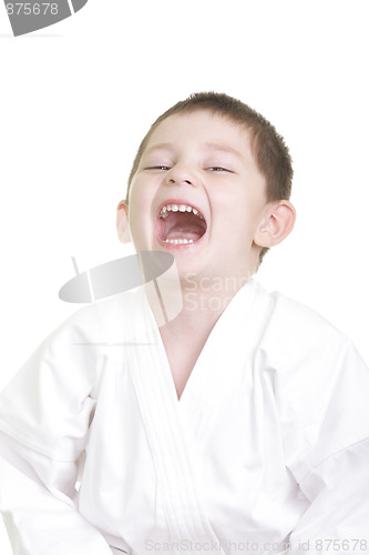 Image of Laughing little karate kid