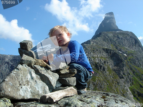 Image of Child on top of mountain