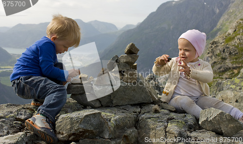 Image of Children building a cairn