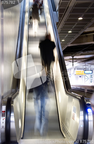 Image of people on escalator