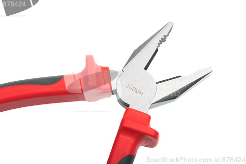 Image of Part of red pliers.