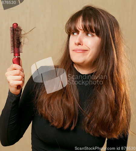 Image of Confused woman with tangled hair