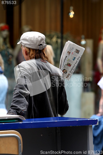 Image of Newspaper man