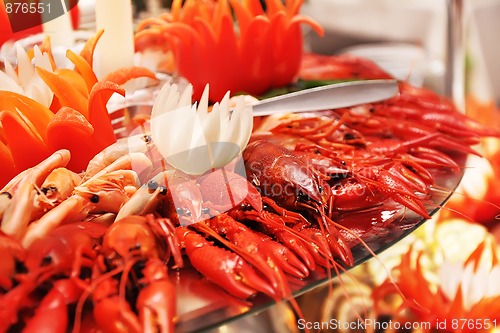 Image of red boiled lobster, crabs and crawfish on a plate