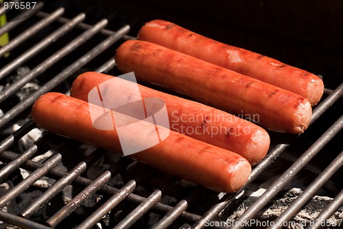 Image of sausages on grill