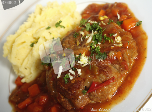 Image of Ossobuco meal angled view