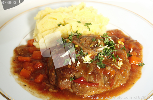 Image of Ossobuco meal side view